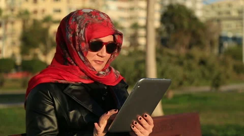 Muslim woman using digital tablet Stock Footage 59081297
