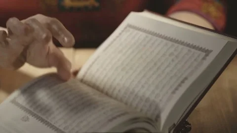 Muslim women reading Holy Koran Stock Footage