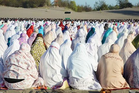 Muslims perform Eid prayers Stock Photos
