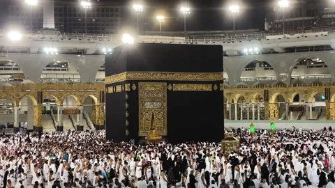 Muslims pilgrims revolve around the Kaaba to hajj, Umrahists Stock Footage 234967687