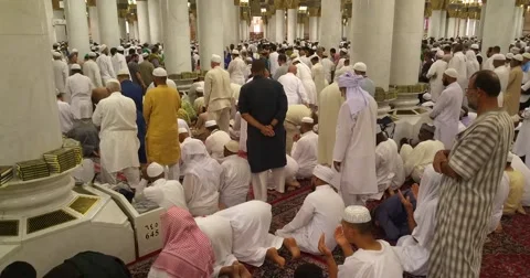Muslims praying inside masjid.  Stock Footage 68994159