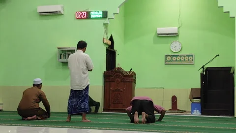 Muslims Praying Inside Mosque During Congregational Prayer Stock Footage 319904242