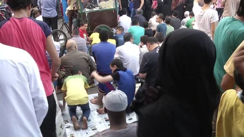 Muslims preparing for Prayer in Streets of Egypt Video stock 82311364