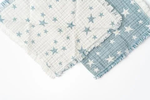 Muslin blanket with star pattern on white background Stock Photos