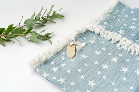 Muslin blanket with star pattern on white background Stock Photos