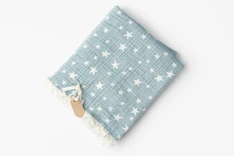 Muslin blanket with star pattern on white background Stock Photos