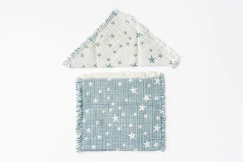 Muslin blanket with star pattern on white background Stock Photos