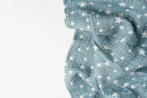 Muslin blanket with star pattern on white background Stock Photos