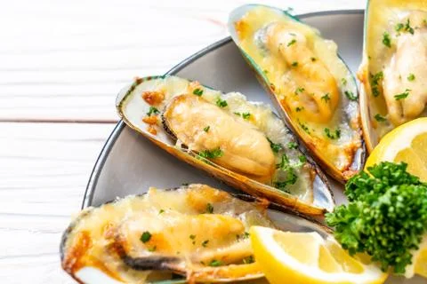 Mussel baked with cheese Stock Photos