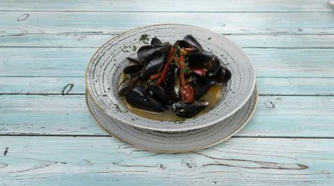Mussel shell sauteed Stock Photos