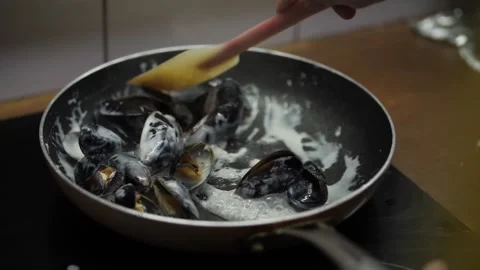 Mussels are cooked in the kitchen Stock Footage 137225755