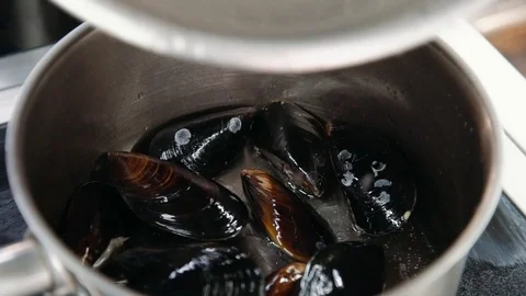 Mussels boiled in restaurant kitchen Stock Footage 120070902