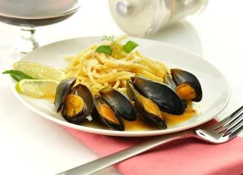Mussels with spaghetti Stock Photos