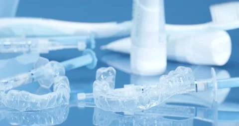 A must-have kit for teeth whitening. Whitening splints. Gel to apply to splints, Stock Footage 170625981