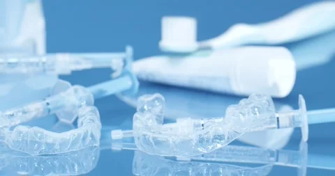 A must-have kit for teeth whitening. Whitening splints. Gel to apply to splints, Stock Footage 170625982