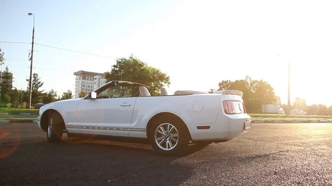 Mustang car on sunset background Stock Footage 78556609