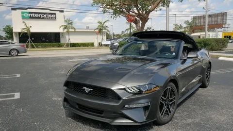 Mustang Putting Top Down Stock Footage 119230285