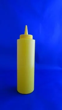 Mustard bottle Stock Photos