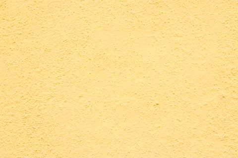 Mustard colored wall texture Stock Photos