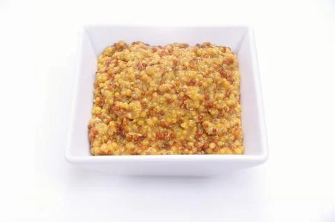 Mustard in dish Stock Photos