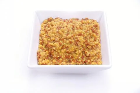 Mustard in dish Stock Photos