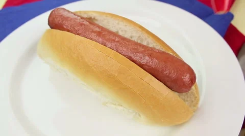 Mustard On Hot Dog Stock Footage 1069315