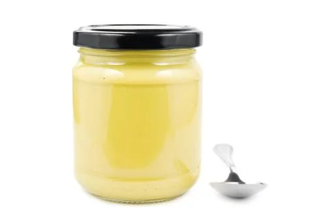 Mustard in jar Stock Photos