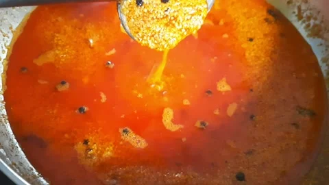 Mustard Split and Spiced Oil Falling from Spoon During Pickle Preparation Video stock 337636876