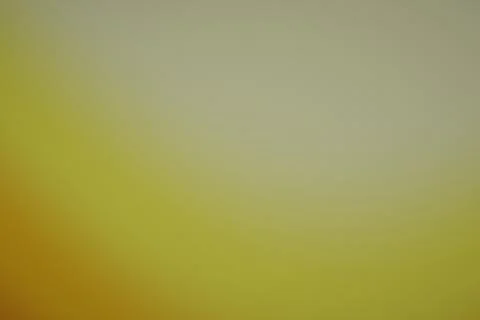 A muted abstract gradient blends warm ochre and olive tones into soft beige.. Stock Illustration