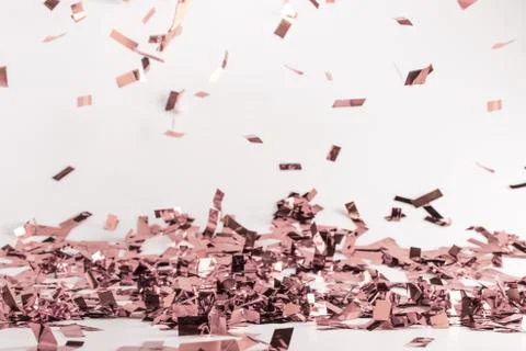 Muted pink falling confetti background Stock Photos