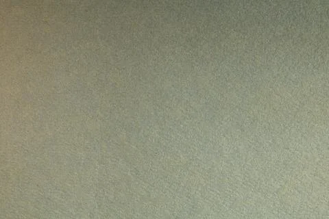 Muted sage green textured construction paper background with subtle grain Stock Photos