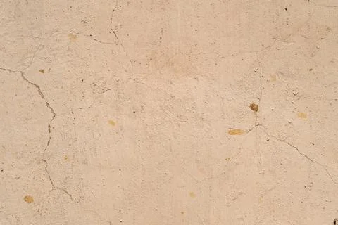 Muted textured background featuring soft hues and subtle cracks. Plain back.. Stock Photos