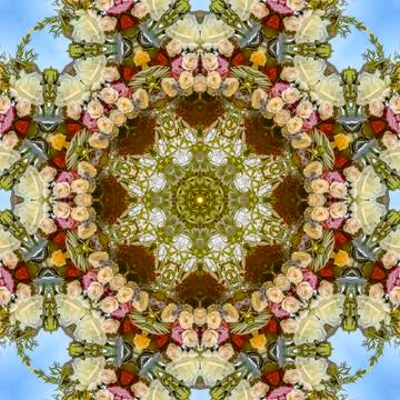 Muted toned down white red and yellow flowers in circular arrangement at wedding Stock Photos