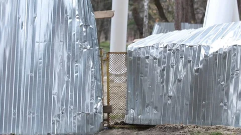 Mutilated Damaged construction fence. Stock Footage 110708144