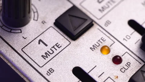 Muting Channel 1 on Mixing Audio Console, Pressing Mute Button, Macro Stock Footage 270466720