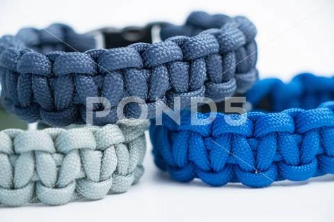 Mutliple Survival Wristlet Paracord close up and isolated on white Stock Photos