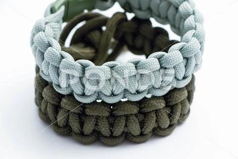 Mutliple Survival Wristlet Paracord close up and isolated on white Stock Photos