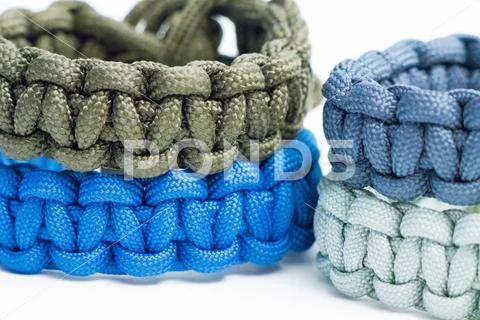 Mutliple Survival Wristlet Paracord close up and isolated on white Stock Photos