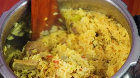 Mutton Biryani in Cooker – Close-Up Delicious Indian Dish Footage Stock Footage 314512159