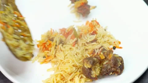 Mutton Biryani, Lamb Biryani, Goat Biryani, Indian Biryani dish Stock Footage 303066569