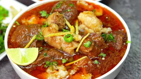 Mutton Bone Marrow Curry, Nalli Nihari – A rich, slow-cooked Indian dish Stock-Footage 303066597