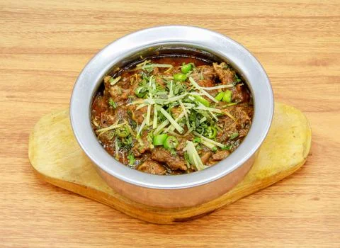 Mutton boneless handi served in a dish isolated on grey background side view  Stock Photos