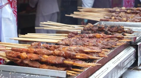 Mutton cubes roasted on a skewer, in Shenzhen, Baoan Food Festival, China. Stock Footage 46204505