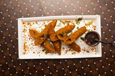 Mutton Sheek Kabab or mutton seekh kebab with sauce served in a dish isolated Stock Photos