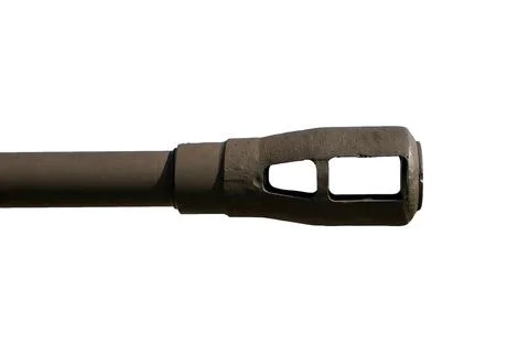 Muzzle brake a device connected to the muzzle of a cannon to reduce recoil and Stock Photos