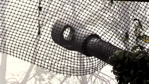 The muzzle of a cannon during a shot during combat. Close-up. A real war Video stock 254363088