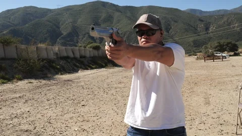 Muzzle flash from Desert eagle pistol Stock Footage 252617840