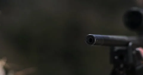 Muzzle of a sniper rifle shooting bullet - Reenactment Stock Footage 202912199