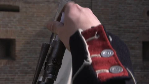 Muzzleloading of an ancient gun. Closeup. Stock Footage 113882132