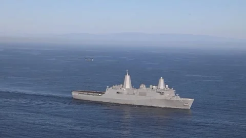 MV-22 Osprey approaching U.S. Marine amphibious dock ship USS Somerset LPD 25 Video stock 289283054